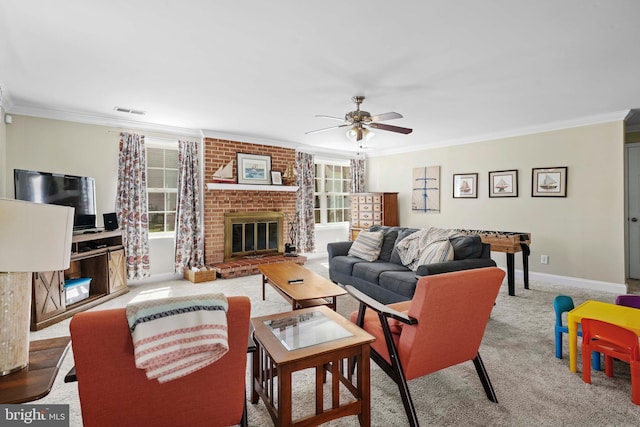 5984 2nd St, Deale, MD 20751 - carpeted living area with a ceiling fan, crown molding, baseboards, a brick fireplace, and visible vents