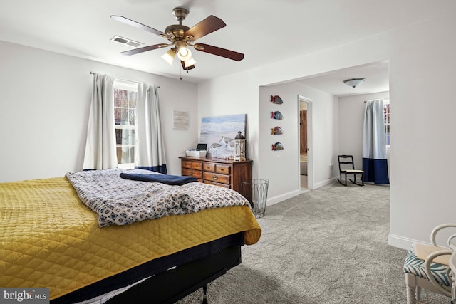 5984 2nd St, Deale, MD 20751 - bedroom with baseboards, visible vents, light colored carpet, and ceiling fan
