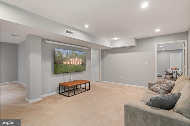 living room with light colored carpet, baseboards, visible vents, and recessed lighting
