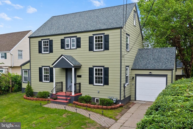 115 Glendale Dr, Ewing, NJ 08618 - colonial home featuring an attached garage, a front lawn, roof with shingles, and concrete driveway
