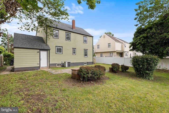 115 Glendale Dr, Ewing, NJ 08618 - back of house featuring a chimney and a shingled roof