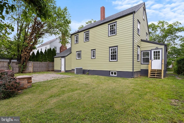 115 Glendale Dr, Ewing, NJ 08618 - rear view of house featuring central AC, a chimney, and entry steps