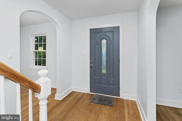 115 Glendale Dr, Ewing, NJ 08618 - entryway featuring arched walkways, wood finished floors, and baseboards