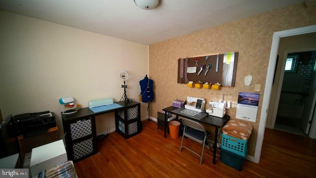 office area with wood finished floors and baseboards