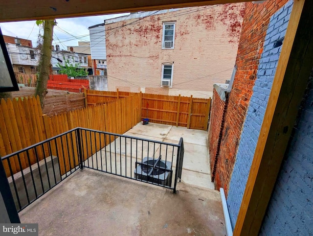 1102 S Carey St, Baltimore, MD 21223 - fenced backyard with a patio