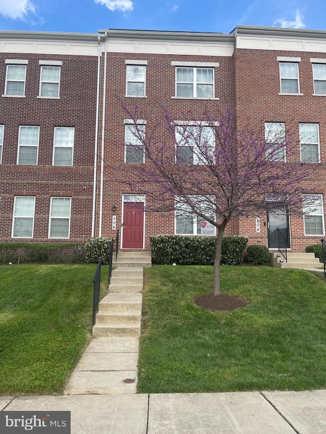 506 Victorianna Dr, Capitol Heights, MD 20743 - multi unit property featuring a front yard and brick siding