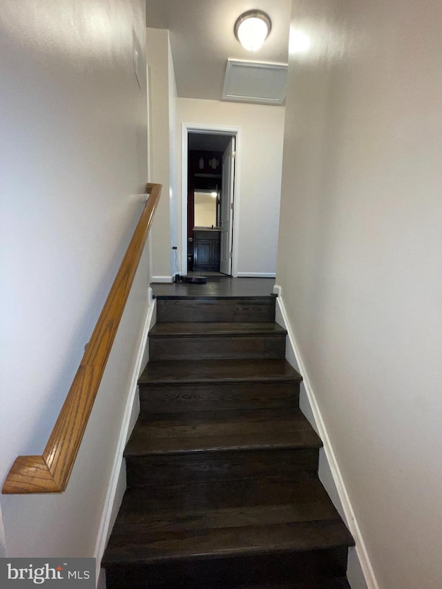506 Victorianna Dr, Capitol Heights, MD 20743 - stairway with baseboards and wood finished floors