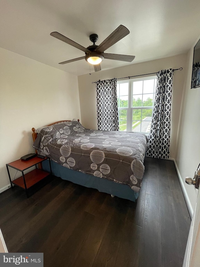 506 Victorianna Dr, Capitol Heights, MD 20743 - bedroom featuring baseboards, wood finished floors, and a ceiling fan
