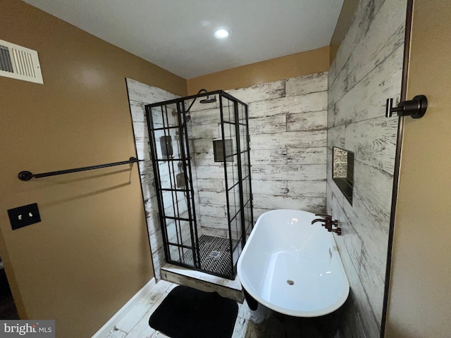 506 Victorianna Dr, Capitol Heights, MD 20743 - full bathroom featuring a sink, visible vents, a stall shower, and a soaking tub