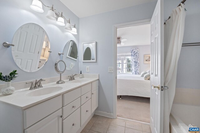 3329 Turnberry Cir, Charlottesville, VA 22911 - bathroom with a sink, double vanity, connected bathroom, and tile patterned flooring