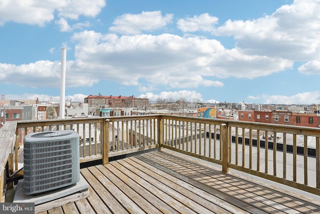 412 Sigel St, Philadelphia, PA 19148 - wooden terrace featuring cooling unit and a playground