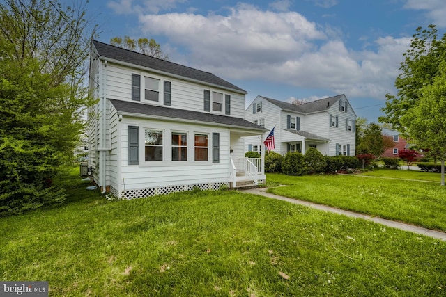 view of front facade with a front lawn