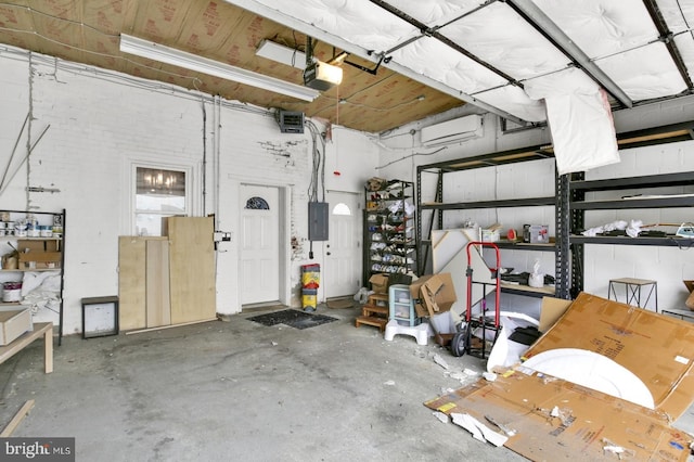1240 Leopard St, Philadelphia, PA 19125 - garage featuring electric panel and a garage door opener