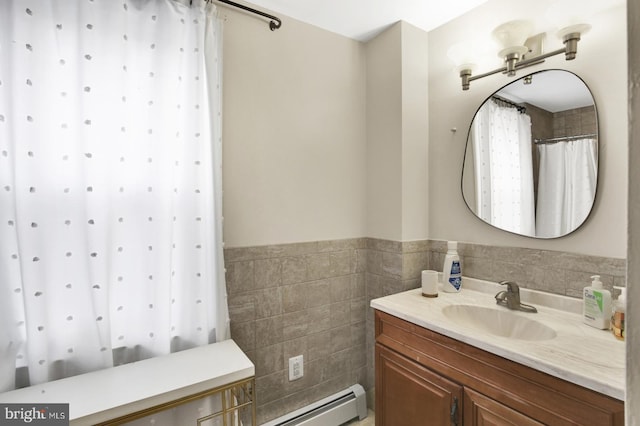 1240 Leopard St, Philadelphia, PA 19125 - full bath featuring vanity, curtained shower, wainscoting, tile walls, and a baseboard radiator