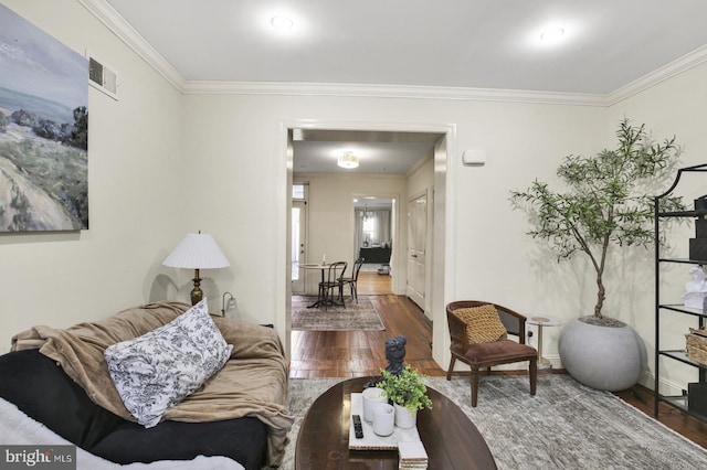 1240 Leopard St, Philadelphia, PA 19125 - living room featuring crown molding, visible vents, baseboards, and hardwood / wood-style flooring