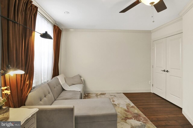 1240 Leopard St, Philadelphia, PA 19125 - living area featuring crown molding, ceiling fan, baseboards, and dark wood finished floors