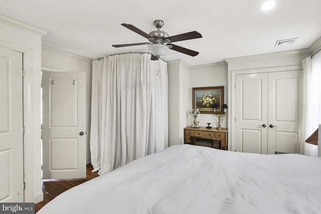 1240 Leopard St, Philadelphia, PA 19125 - bedroom with dark wood-style flooring, a closet, ornamental molding, visible vents, and ceiling fan