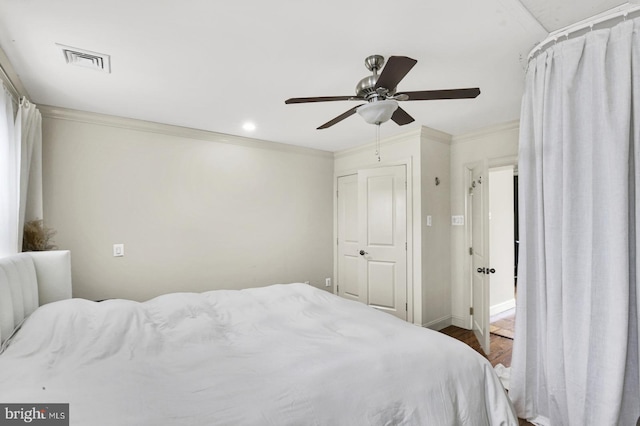 1240 Leopard St, Philadelphia, PA 19125 - bedroom with ornamental molding, recessed lighting, a ceiling fan, visible vents, and wood finished floors