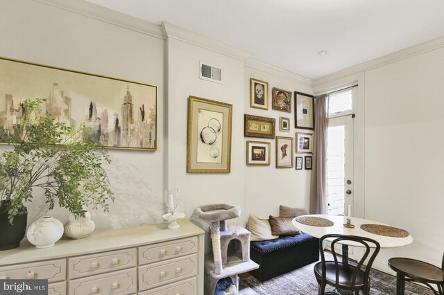 1240 Leopard St, Philadelphia, PA 19125 - sitting room featuring crown molding and visible vents
