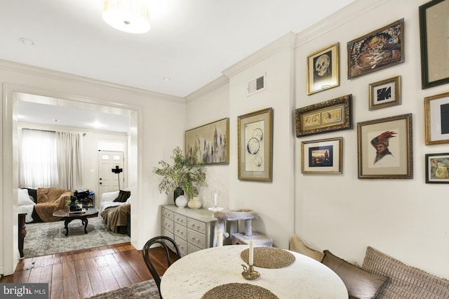 1240 Leopard St, Philadelphia, PA 19125 - dining space with ornamental molding, visible vents, and wood-type flooring