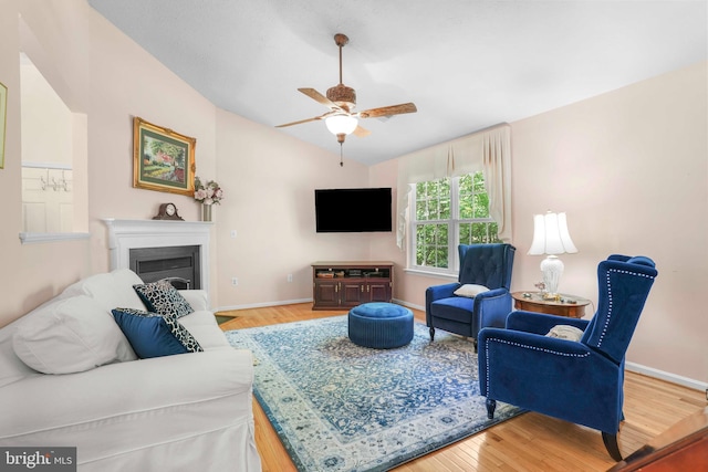 37217 Asher Rd, Mechanicsville, MD 20659 - living room featuring baseboards, ceiling fan, wood finished floors, and lofted ceiling