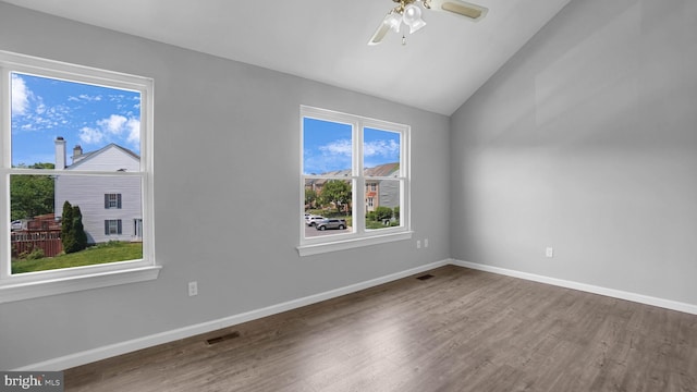 1315 Riverwood, Baltimore, MD 21226 - unfurnished room with visible vents, wood finished floors, baseboards, a ceiling fan, and vaulted ceiling