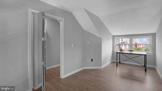 1315 Riverwood, Baltimore, MD 21226 - bonus room featuring baseboards, vaulted ceiling, and wood finished floors