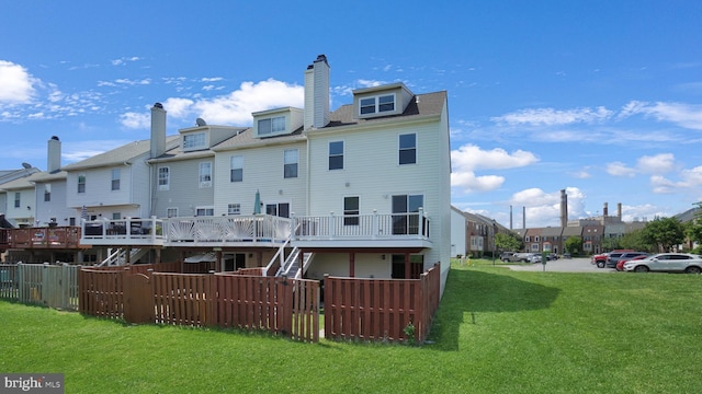 1315 Riverwood, Baltimore, MD 21226 - rear view of house featuring a lawn, fence, a residential view, and a wooden deck