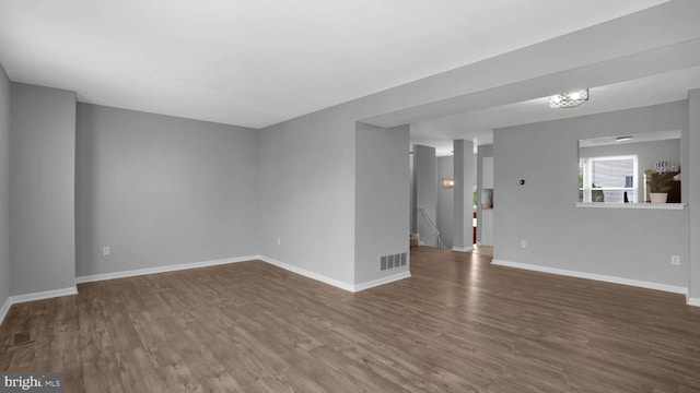 1315 Riverwood, Baltimore, MD 21226 - empty room featuring visible vents, baseboards, and wood finished floors