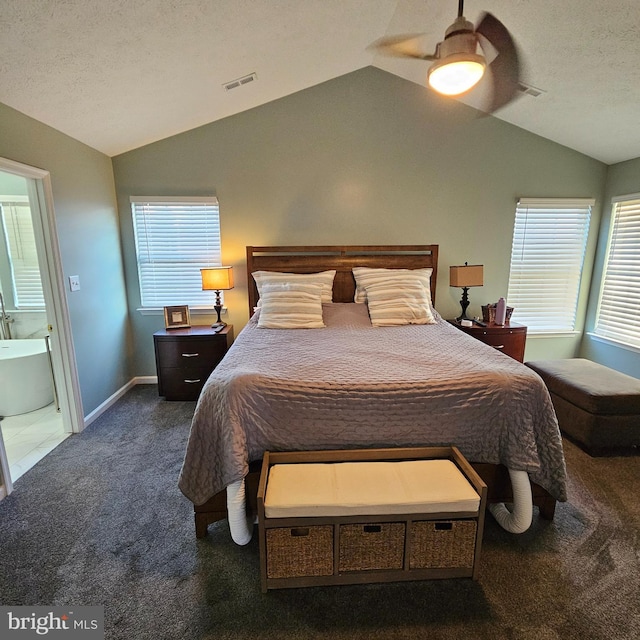 carpeted bedroom featuring visible vents, baseboards, a ceiling fan, and lofted ceiling