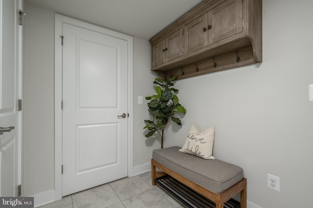 12455 Sea Oaks Ln Unit 4, Berlin, MD 21811 - mudroom featuring light tile patterned floors and baseboards