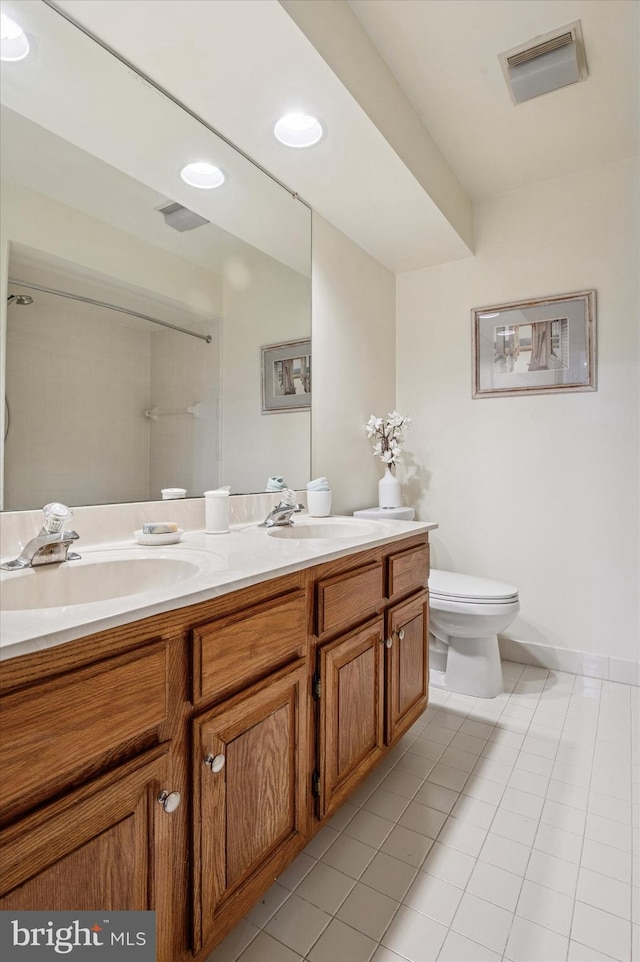 28 Beech Hill Dr, Newark, DE 19711 - full bath with toilet, tile patterned flooring, a sink, and visible vents
