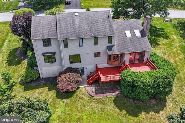 28 Beech Hill Dr, Newark, DE 19711 - rear view of property featuring a lawn, a chimney, and a deck