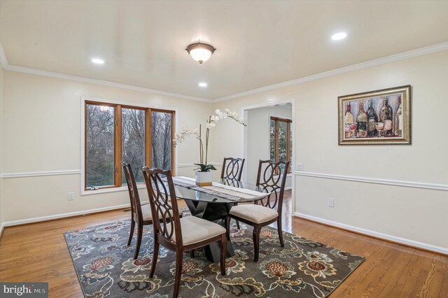 28 Beech Hill Dr, Newark, DE 19711 - dining room with baseboards, ornamental molding, wood finished floors, and a wealth of natural light