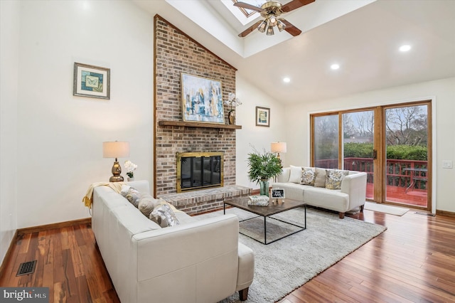 28 Beech Hill Dr, Newark, DE 19711 - living room featuring a ceiling fan, visible vents, high vaulted ceiling, and hardwood / wood-style flooring