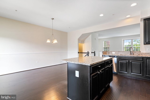 5542 Peanuts Ln, Waldorf, MD 20602 - kitchen featuring a kitchen island, dishwasher, a sink, dark wood-style floors, and dark cabinets