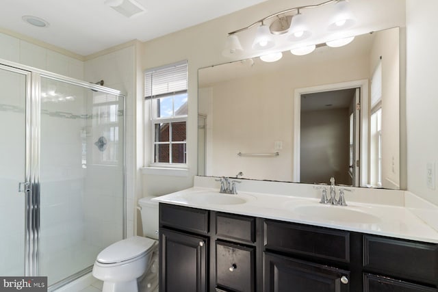 5542 Peanuts Ln, Waldorf, MD 20602 - full bathroom with a sink, a shower stall, toilet, and double vanity