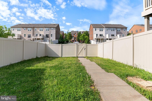 5542 Peanuts Ln, Waldorf, MD 20602 - view of yard featuring a residential view, a gate, and a fenced backyard
