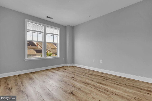 503 King Farm Blvd Unit 306, Rockville, MD 20850 - spare room with wood finished floors and baseboards