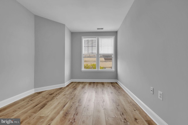 503 King Farm Blvd Unit 306, Rockville, MD 20850 - unfurnished room featuring light wood-style floors and baseboards