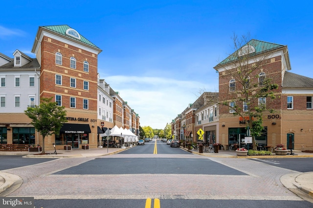 503 King Farm Blvd Unit 306, Rockville, MD 20850 - view of asphalt road with curbs, sidewalks, and street lights