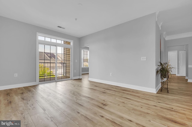 503 King Farm Blvd Unit 306, Rockville, MD 20850 - spare room with light wood-type flooring, baseboards, and ornamental molding