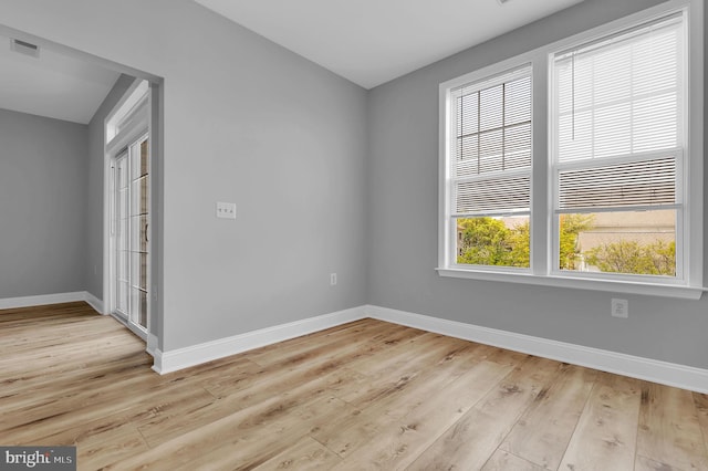503 King Farm Blvd Unit 306, Rockville, MD 20850 - spare room with baseboards and light wood-style floors