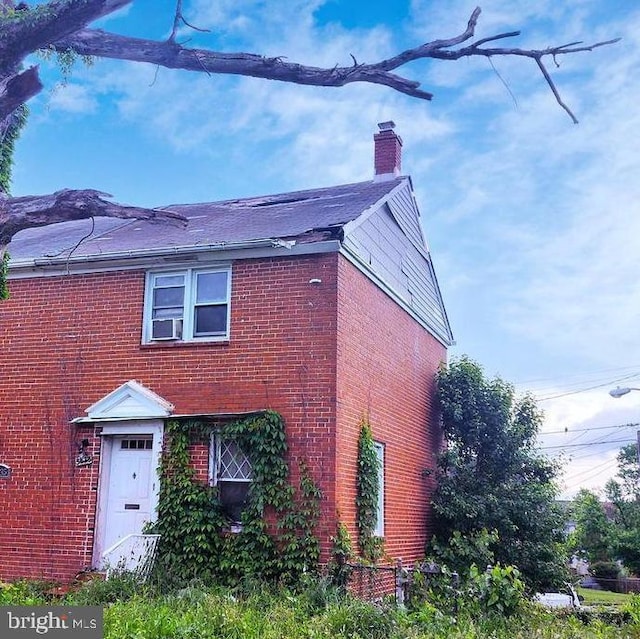 5533 Midwood Ave, Baltimore, MD 21212 - view of front of home featuring a chimney and brick siding