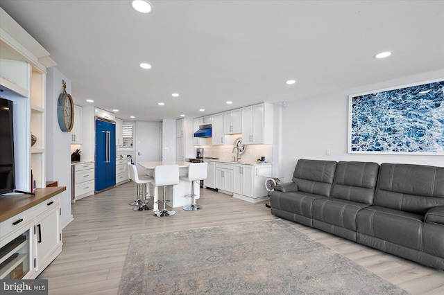 8500 Coastal Hwy Unit 805, Ocean City, MD 21842 - living area with recessed lighting and light wood-style floors