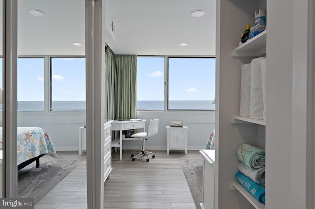 8500 Coastal Hwy Unit 805, Ocean City, MD 21842 - office area with a water view, baseboards, and wood finished floors