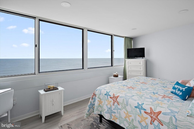 8500 Coastal Hwy Unit 805, Ocean City, MD 21842 - bedroom featuring baseboards and wood finished floors