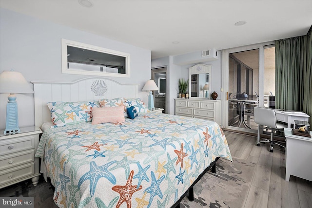 8500 Coastal Hwy Unit 805, Ocean City, MD 21842 - bedroom featuring visible vents and wood finished floors