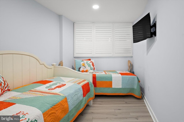 8500 Coastal Hwy Unit 805, Ocean City, MD 21842 - bedroom featuring baseboards, recessed lighting, and wood finished floors