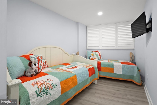 8500 Coastal Hwy Unit 805, Ocean City, MD 21842 - bedroom featuring wood finished floors, baseboards, and recessed lighting